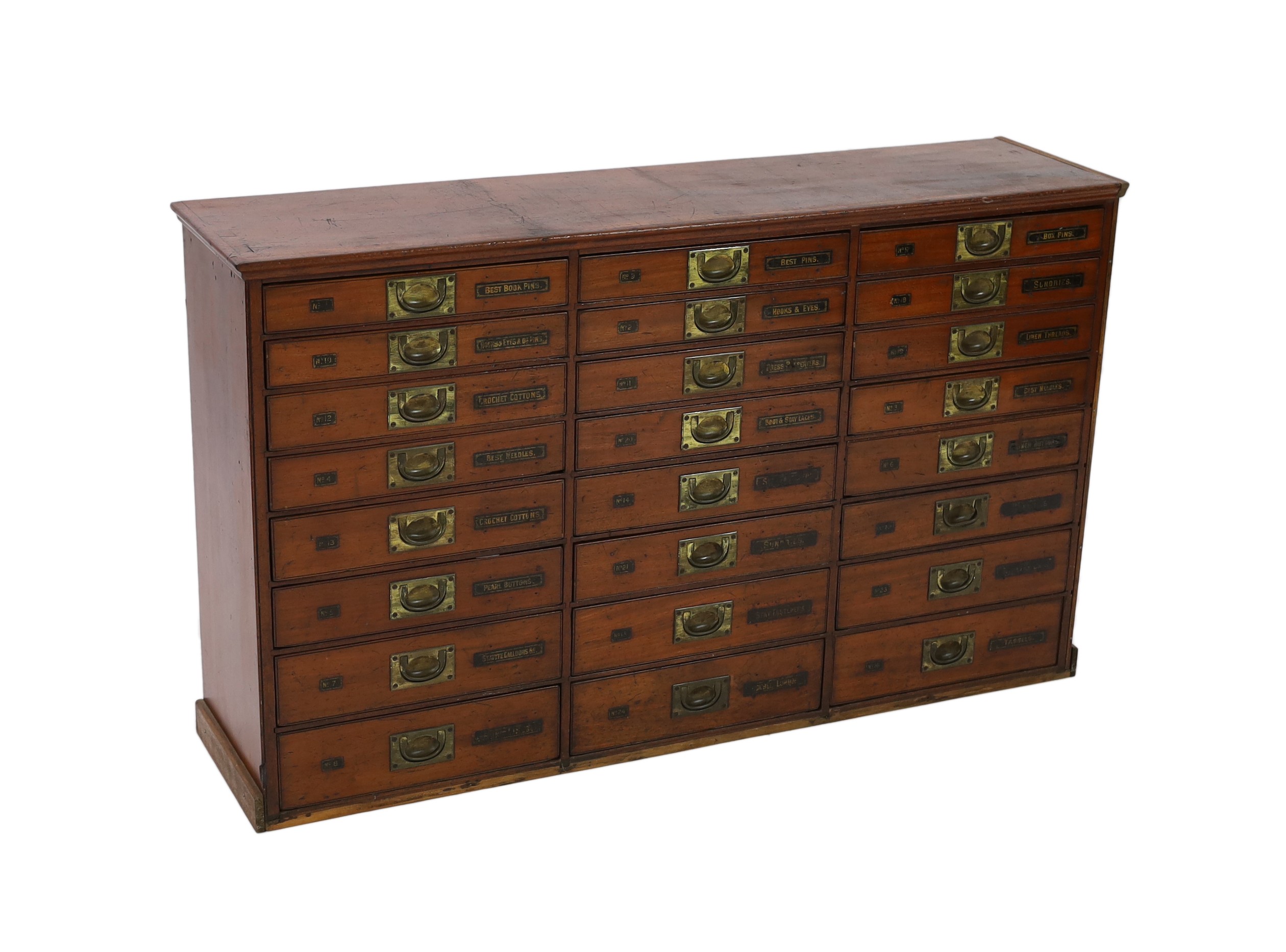 A Victorian mahogany haberdashery cabinet of twenty four drawers